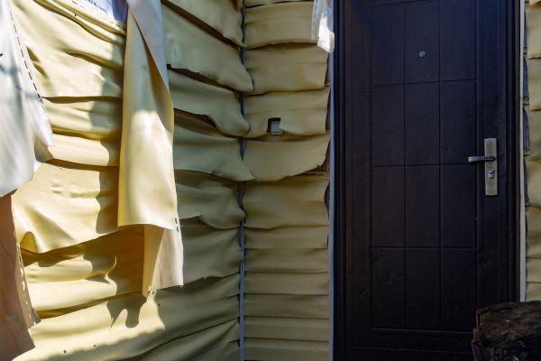 Cost of Melted Siding Replacement in Evergreen