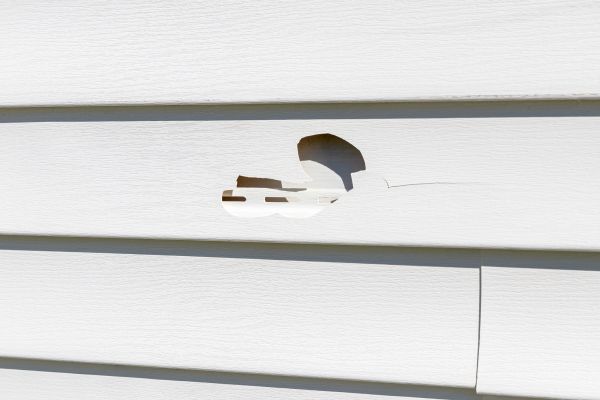 White Vinyl Siding Repair in Evergreen